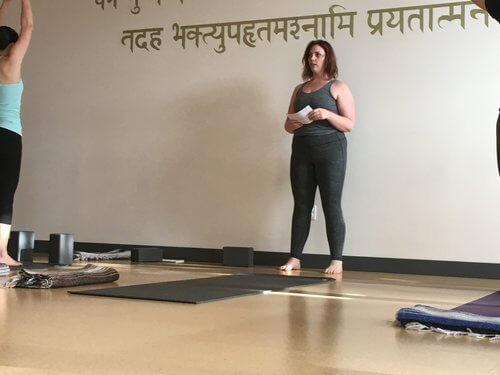 picture of Emily teaching yoga class at Bhaktishop